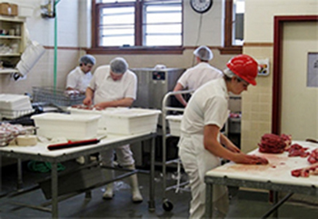 meat lab staff working.