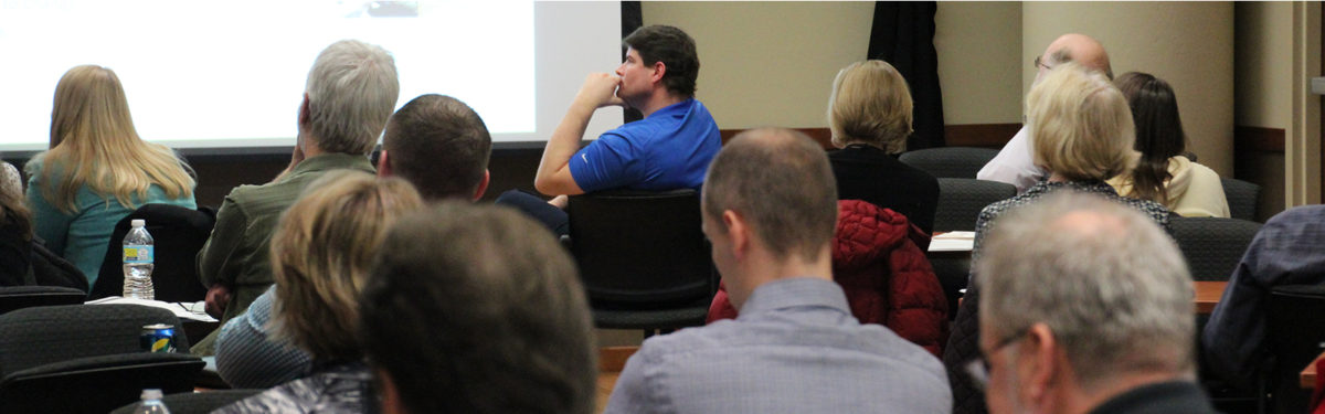audience listening at a session.